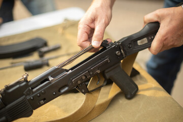 Arms assembly. Military Training Camp. Shooting training.