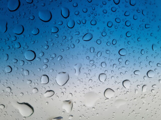 Raindrops on the car glass. Selective focus