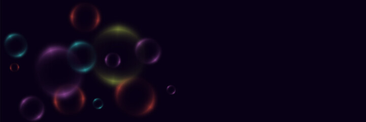 Abstract background with neon bubbles, iridescent colorful glass balls or spheres on a black background.
