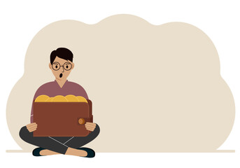 A man sits cross-legged and holds a large purse of coins. The concept of a savings wallet, a successful loan, golden earnings with metal money in the currency.
