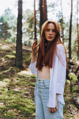 Beautiful woman natural face freckles casual female portrait lifestyle beauty girl. Outdoor girl portrait in green summer forest