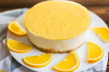 Sugar dessert, cake with cream and citrus. Holiday baking. Homemade pastry