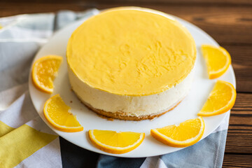 Sugar dessert, cake with cream and citrus. Holiday baking. Homemade pastry