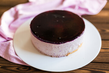 Sugar dessert, cake with cream and chocolate. Holiday baking. Homemade pastry