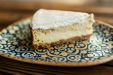Sugar dessert, cake with cream and chocolate. Holiday baking. Homemade pastry