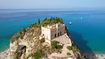 Naklejka na ściany i meble Tropea - Italy - Aerial view of the Byzantine pilgrimage church from the Middle Ages on a steep rock overlooking the sea