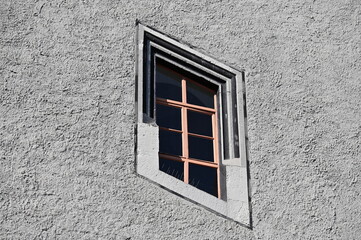 A window in a rhombic, diagonal structure in an old house in Weimar-Germany.