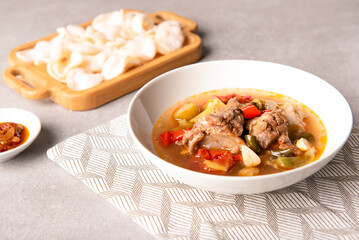Asem-asem daging iga sapi or beef rib soup with sweet and sour taste. Homemade soup food originates from Central Java but is also famous in East Java, Indonesia