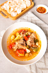 Asem-asem daging iga sapi or beef rib soup with sweet and sour taste. Homemade soup food originates from Central Java but is also famous in East Java, Indonesia