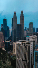 City Skyline Malaysia's Petronas Twin Towers in Kuala Lumpur - October - 2023 - obrazy, fototapety, plakaty