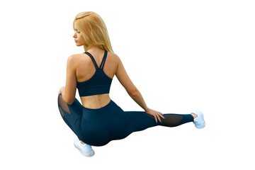 Fototapeta premium Fit woman in sitting on the floor isolated on white. Slim attractive female with flat belly relaxed or stretching
