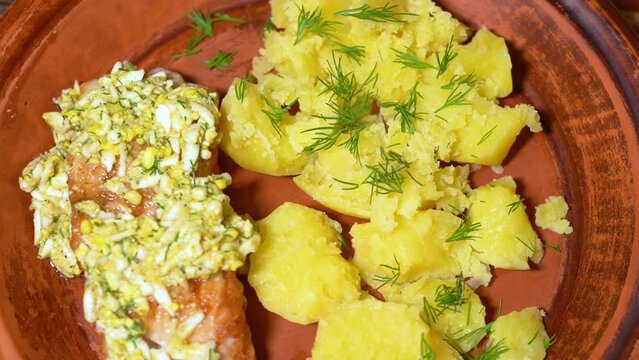 Zander fillets with potatoes on a plate