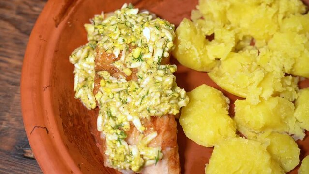 Zander fillets with potatoes on a plate