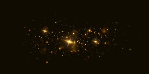 Golden sequins glow with many lights. Glittering dust. Luxurious background of golden particles.	