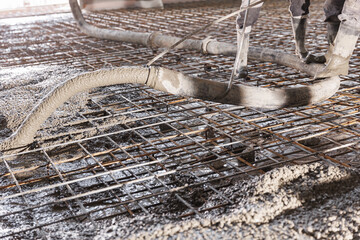 Workers work on concrete concreting floors of buildings in construction site, Concept pouring...