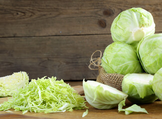 organic white cabbage on wooden table