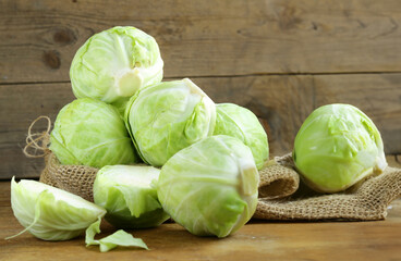 organic white cabbage on wooden table
