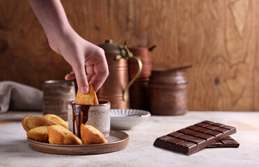 french traditional madeleine biscuits with chocolate sauce - obrazy, fototapety, plakaty