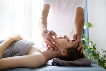 Face lifting massage at spa salon