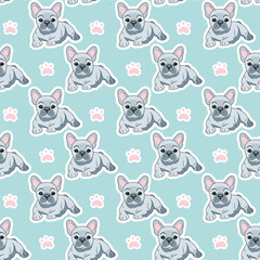 Seamless pattern of gray lying French bulldog babies on a blue background with paw prints
