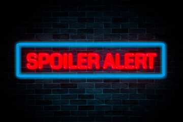 Spoiler Alert neon banner on brick wall background.
