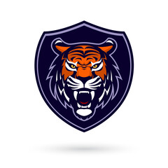 Obraz premium A fierce and powerful tiger mascot head logo, perfect for esport and gaming teams. The design features a tiger in a shield, representing strength and competitiveness