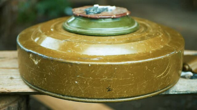  Neutralized anti-tank mine close-up.Anti-tank mine TM-62 close-up