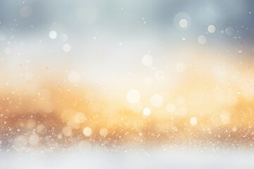 Snowfall texture on blurry background. Silver, blue and gold abstract blurred bokeh lights. Christmas and New Year holiday backdrop with copy space