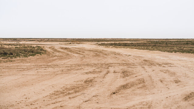 The international highway in Uzbekistan is of very poor quality, an old road in the desert