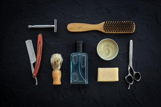 Flat lay with shaving accessories and cosmetic beauty products for men