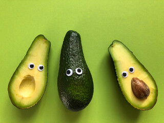 Avocados with comic googly eyes