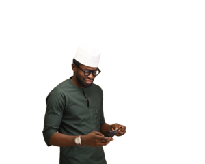 An African man with his Credit card paying his bills and banking using his mobile phone and Credit. He is using his credit card to book an international flight. online banking concept and paying bills