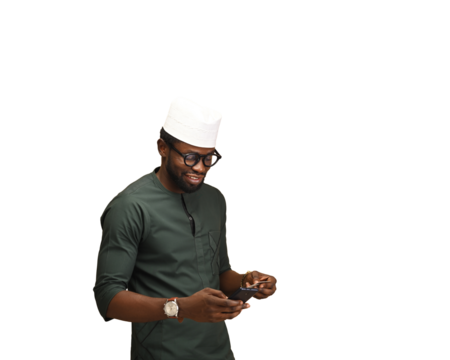 An African man with his Credit card paying his bills and banking using his mobile phone and Credit. He is using his credit card to book an international flight. online banking concept and paying bills