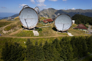 Old data transmission dishes in an abandoned base
