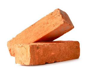 Cracked old red or orange bricks in stack isolated on white background with clipping path