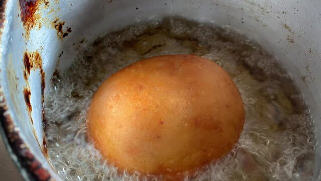 Video of the preparation of "Papa Rellena". traditional Peruvian food made with potatoes. Concept of food.