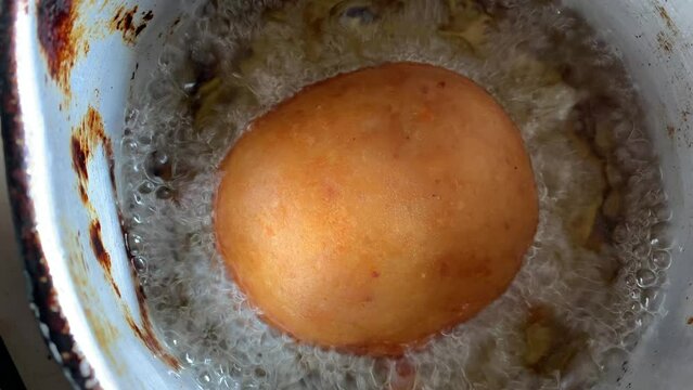 Video of the preparation of "Papa Rellena". traditional Peruvian food made with potatoes. Concept of food.