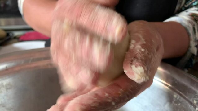 Video of the preparation of "Papa Rellena". traditional Peruvian food made with potatoes. Concept of food.