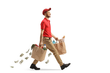 Money falling from grocery bags carried by a delivery guy