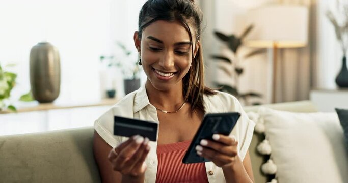 Woman, credit card and phone with smile, sofa or check for cybersecurity, fintech app or banking info. Girl, smartphone and easy payment for customer experience, budget or sales on e commerce website