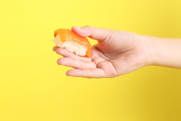 Hand with Sushi