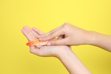 Hand with Sushi