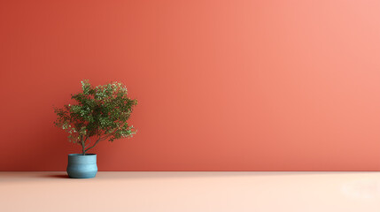 A red wall with copy space and a green plant in the corner and a bright, natural light coming from the side