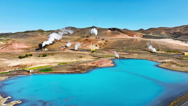 Modern geothermal energy power plant working, Located in a picturesque volcanic landscape in Iceland.