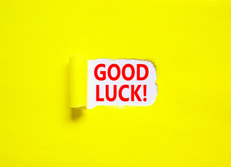 Good luck symbol. Concept words Good luck on beautiful white paper. Beautiful yellow paper background. Business, motivational good luck concept. Copy space.