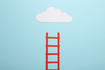 Paper stairs and cloud on blue background. Dreaming, goals, business concept.