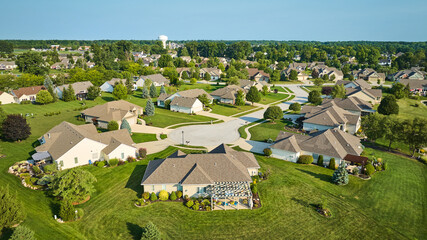 Culdesac with houses around it in suburban neighborhood aerial