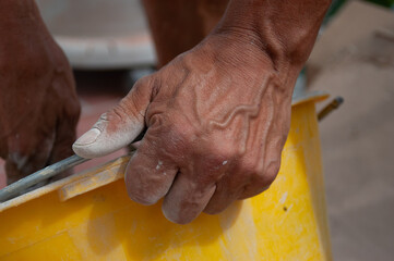 hands of a bricklayer