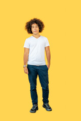 Beautiful smiling young mixed-race Afro-Italian in his twenties, Ten z. Full length profile image of a mixed race man wearing modern sneakers with shirt pants dressed in casual clothes isolated on