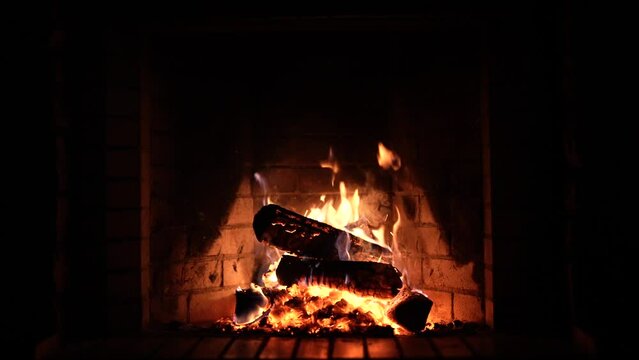 Fireplace. Cozy Relaxing Fireplace. Firewood. Flames of a country house. Warmth and home comfort. Hearth. fire is burning in the fireplace. beautiful fire in the fireplace, Wood burning 